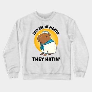 They see me floatin they hatin Capybara Sailor Crewneck Sweatshirt